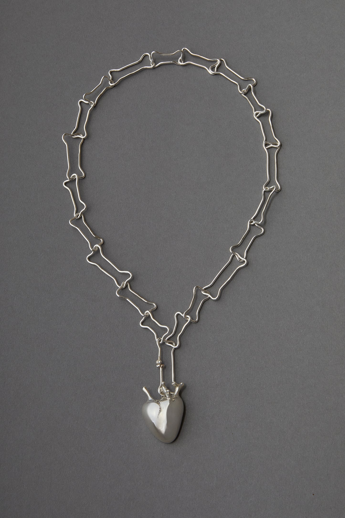 Cadena Huesitos con colgante Corazón