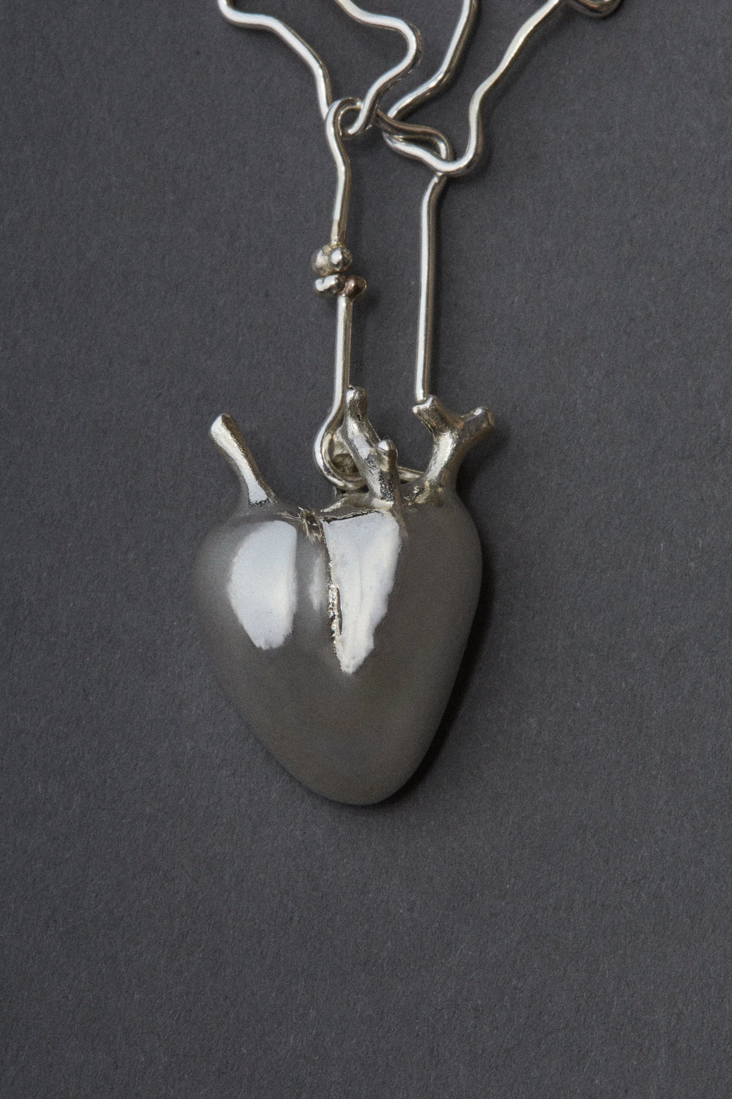 Cadena Huesitos con colgante Corazón